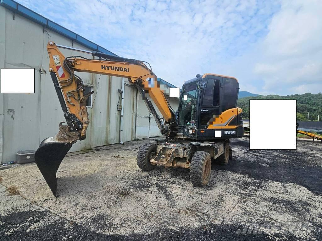 Hyundai HW60 حفارات بعجل