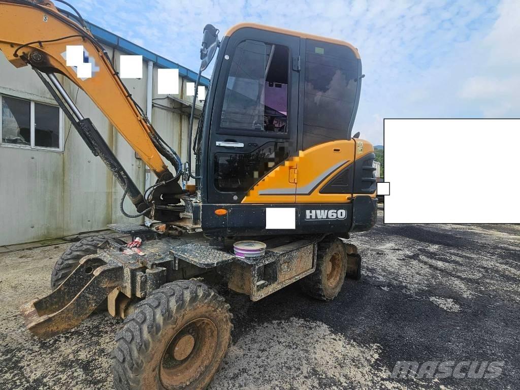 Hyundai HW60 حفارات بعجل