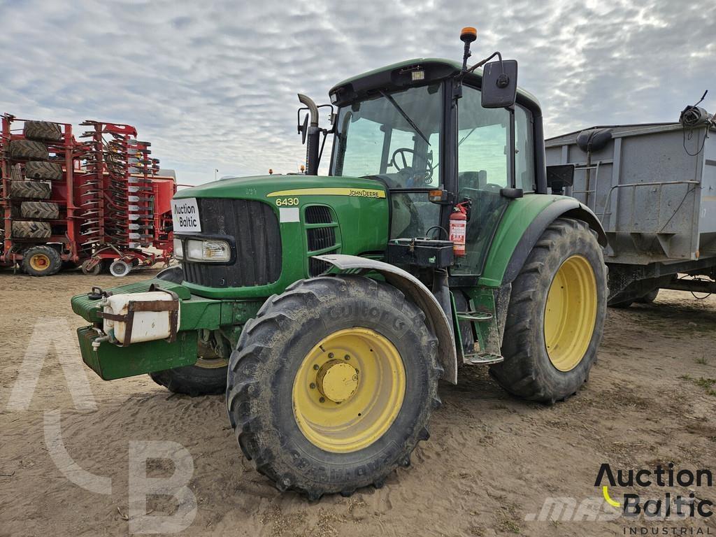 John Deere 6430 الجرارات