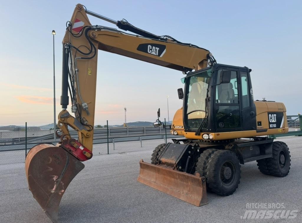 CAT M 316 D حفارات بعجل