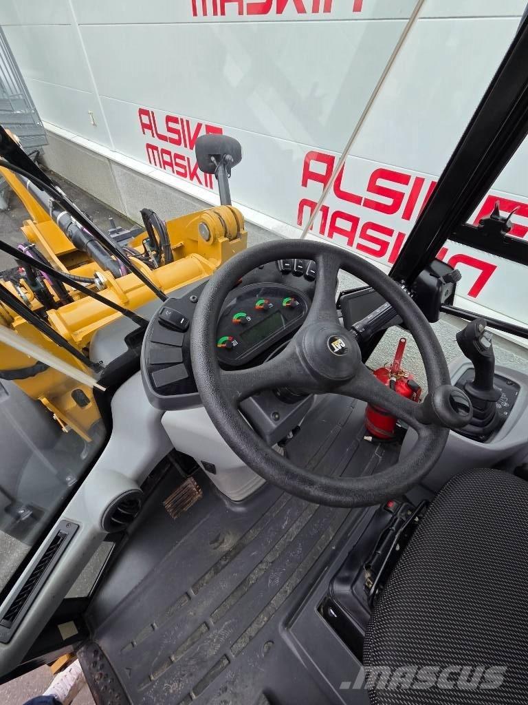 CAT 906 لوادر بعجل