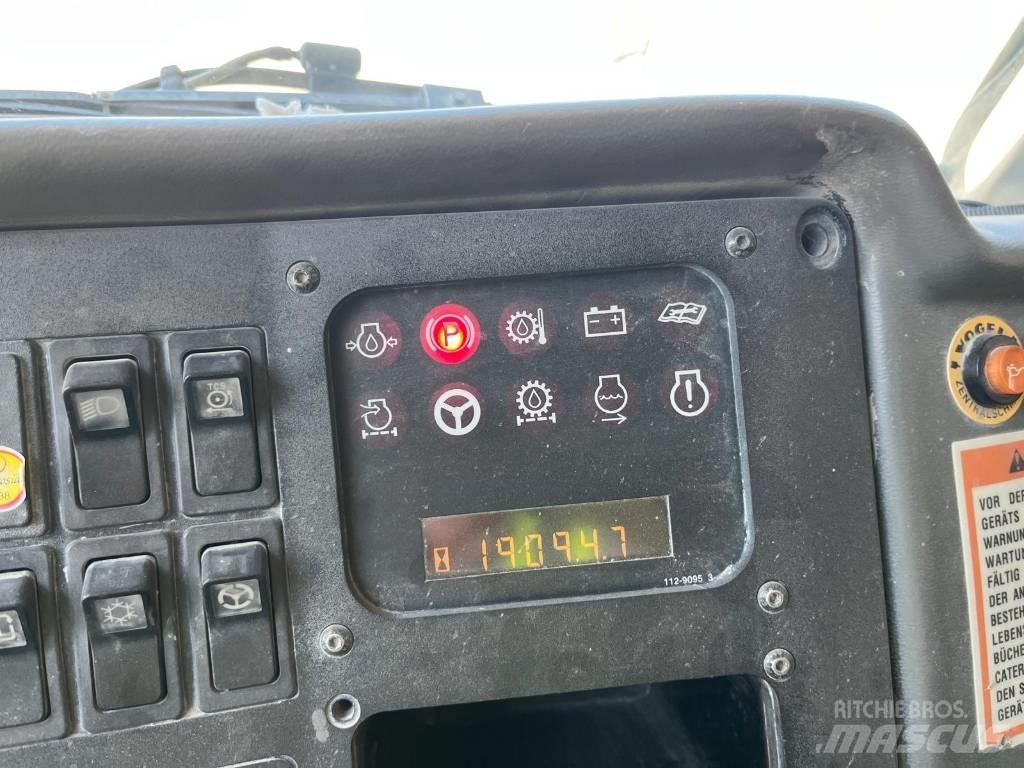 CAT 771D شاحنات المخلفات الصلبة