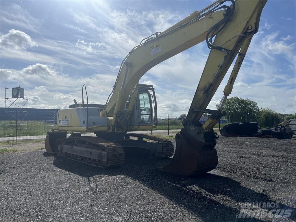 New Holland E 265 B حفارات زحافة