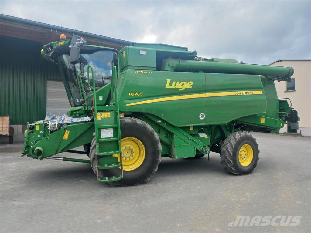 John Deere T670 HM حصادات