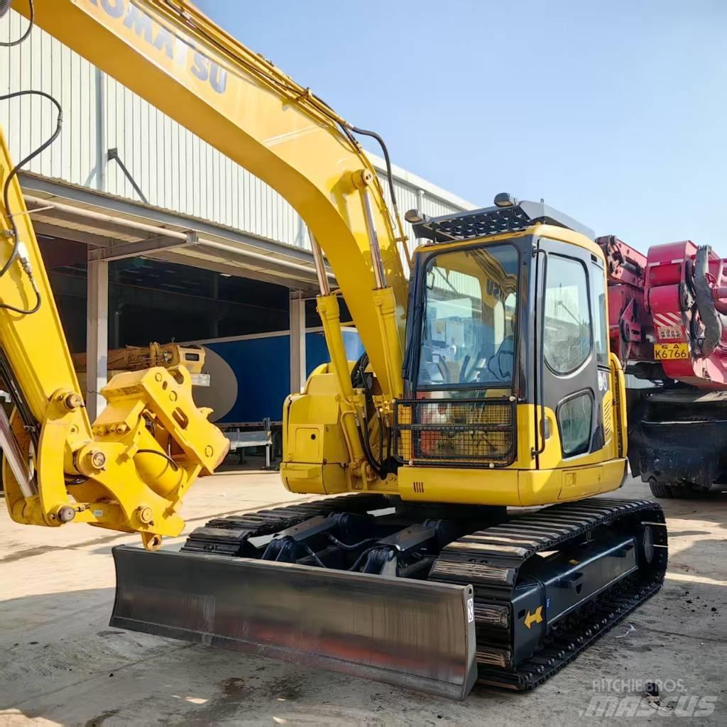 Komatsu PC 128 US حفارات وسط 7 طن - 12 طن