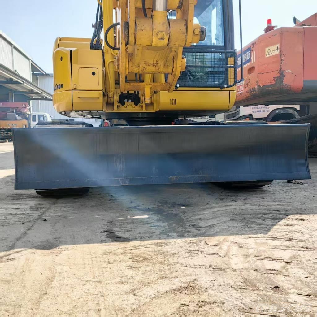 Komatsu PC 128 US حفارات وسط 7 طن - 12 طن