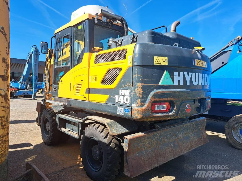 Hyundai HW140 حفارات بعجل