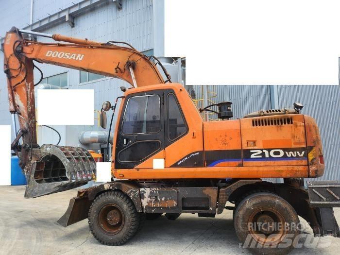 Daewoo Solar 210 W V حفارات بعجل