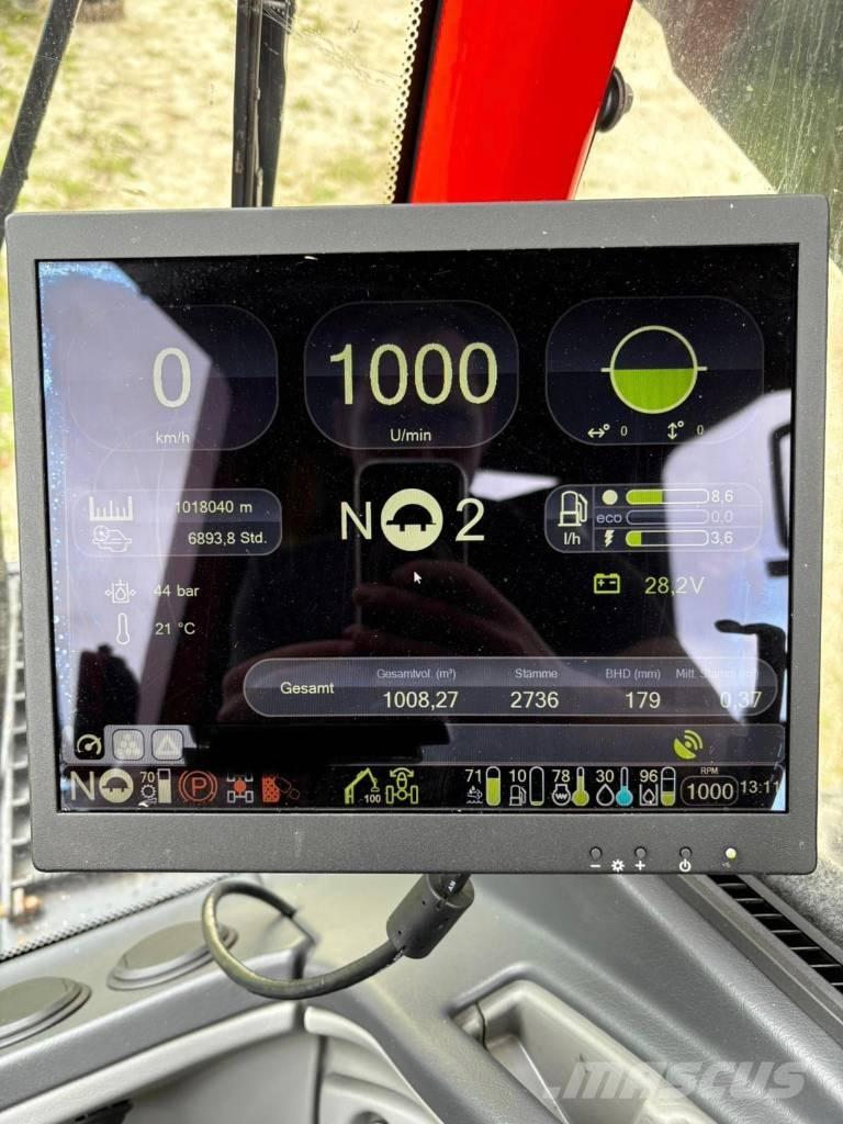 Komatsu 931xc حصادات