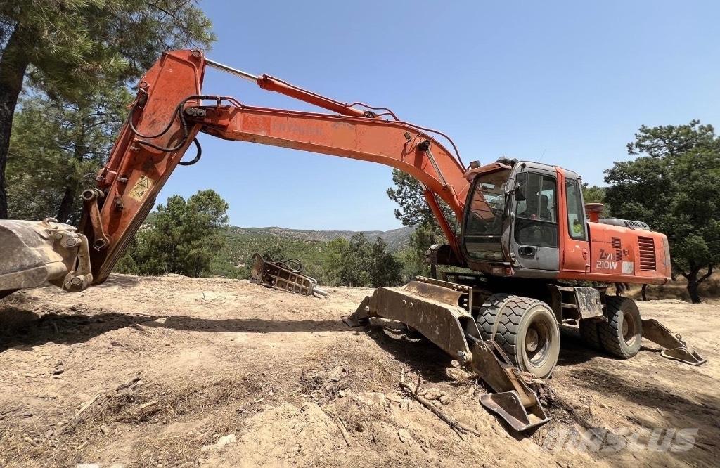 Hitachi ZX 210 W حفارات بعجل