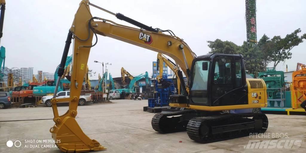 CAT 2021 CAT 313D2GC حفارات بعجل