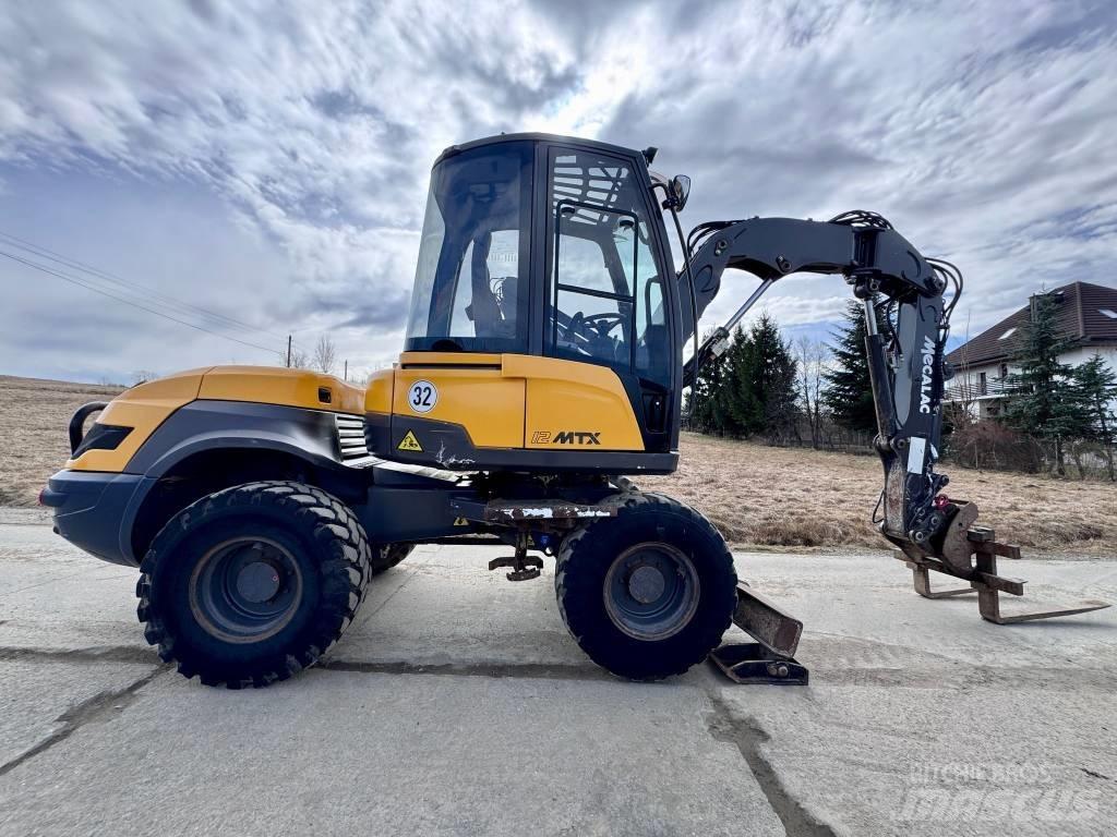 Mecalac 12 MTX لوادر ذات جرافات عكسية