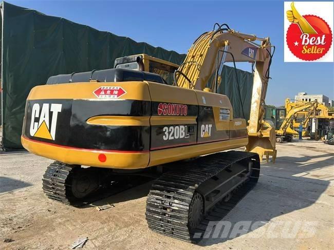 CAT 320 B حفارات زحافة