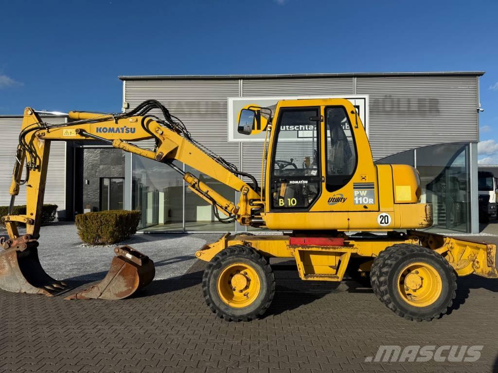 Komatsu PW 110 حفارات بعجل