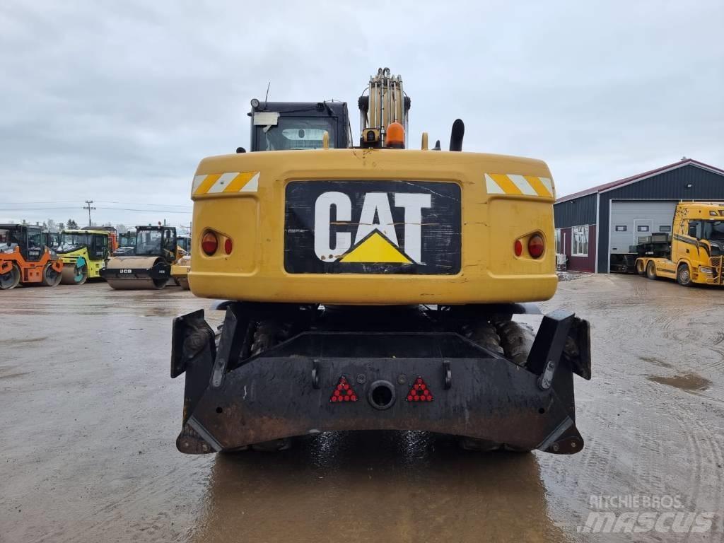 CAT M 315 D II حفارات بعجل