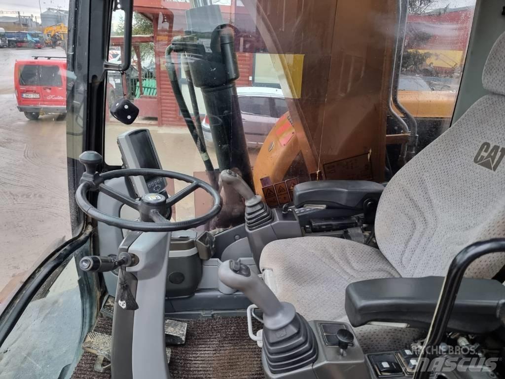 CAT M 315 D II حفارات بعجل