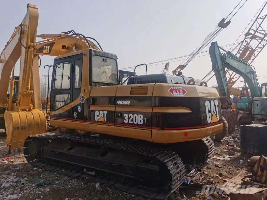CAT 320BL حفارات زحافة