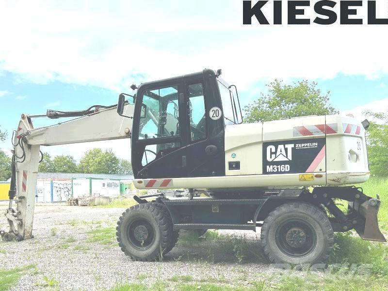 CAT M 316 D حفارات بعجل