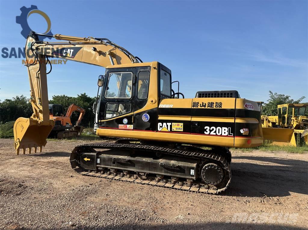 CAT 320 B L حفارات زحافة