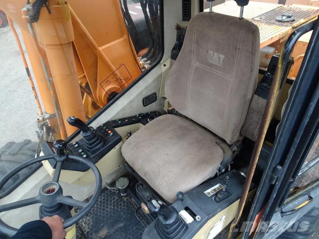 CAT M315 حفارات بعجل