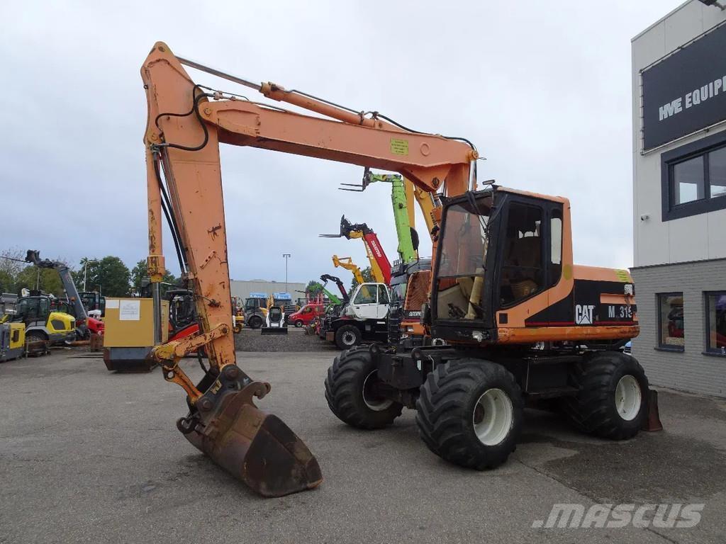 CAT M315 حفارات بعجل