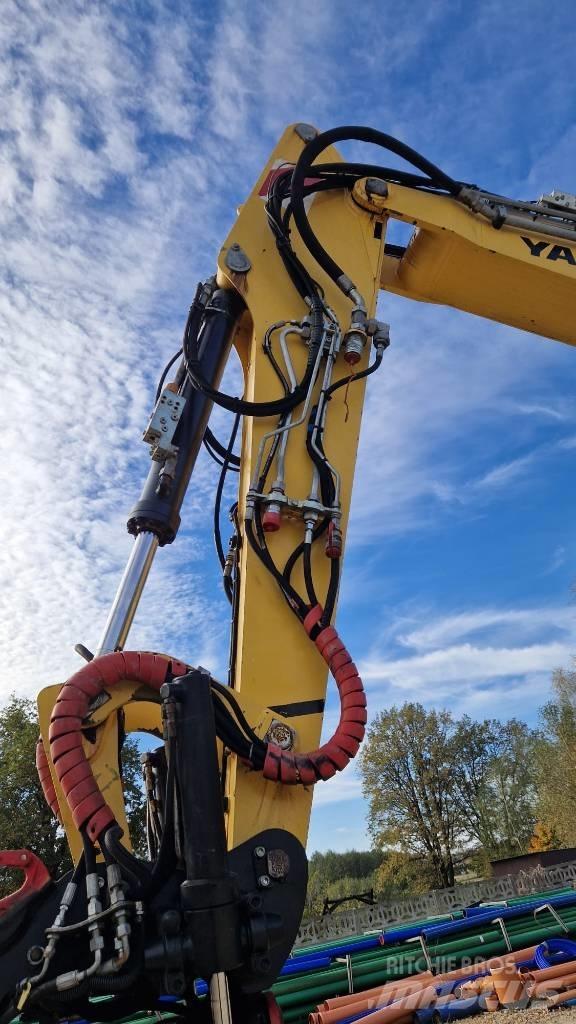 Yanmar B 110 W حفارات بعجل
