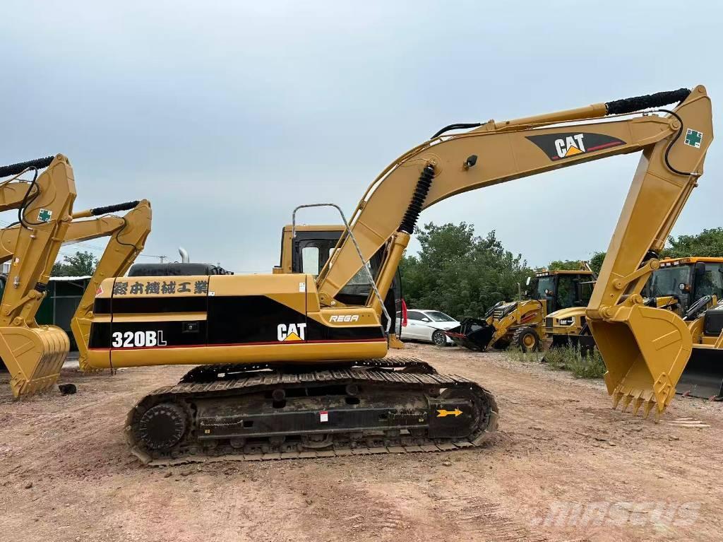 CAT 320BL حفارات زحافة