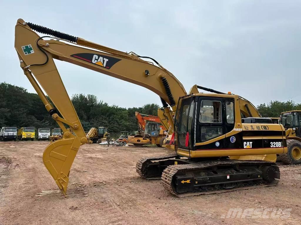 CAT 320BL حفارات زحافة