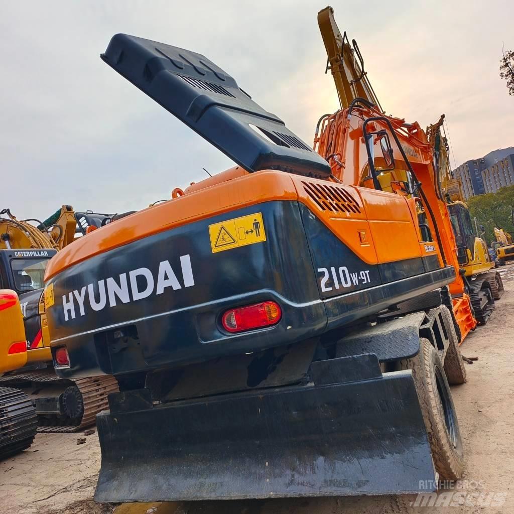 Hyundai 210W-9 حفارات بعجل