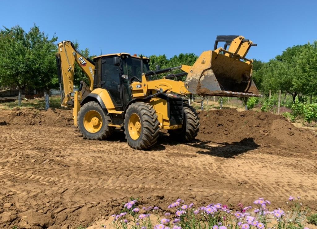 CAT 434 لوادر ذات جرافات عكسية