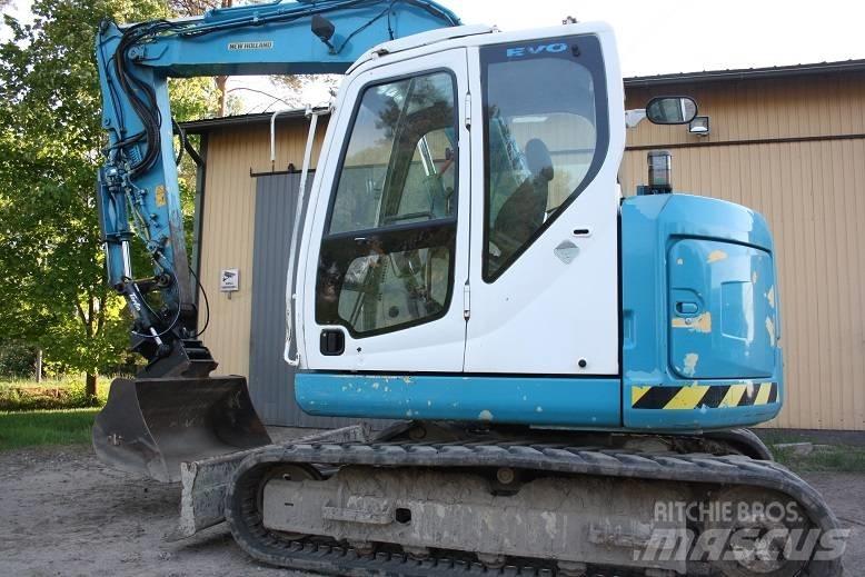  New Hollan E 70 BSR حفارات وسط 7 طن - 12 طن