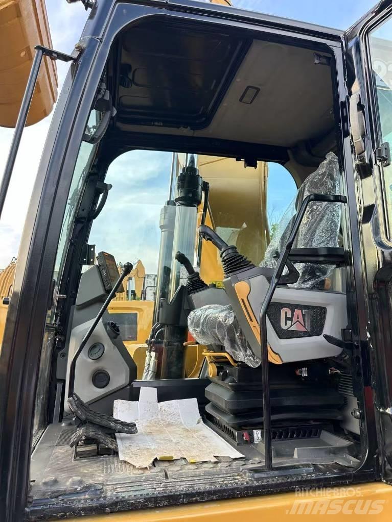 CAT 323 gc حفارات زحافة