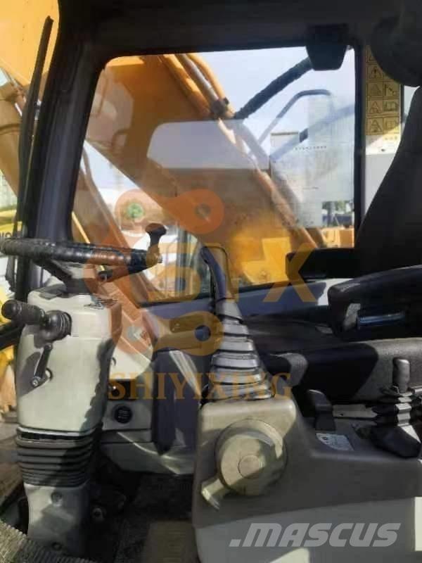 Hyundai 210W-7 حفارات بعجل