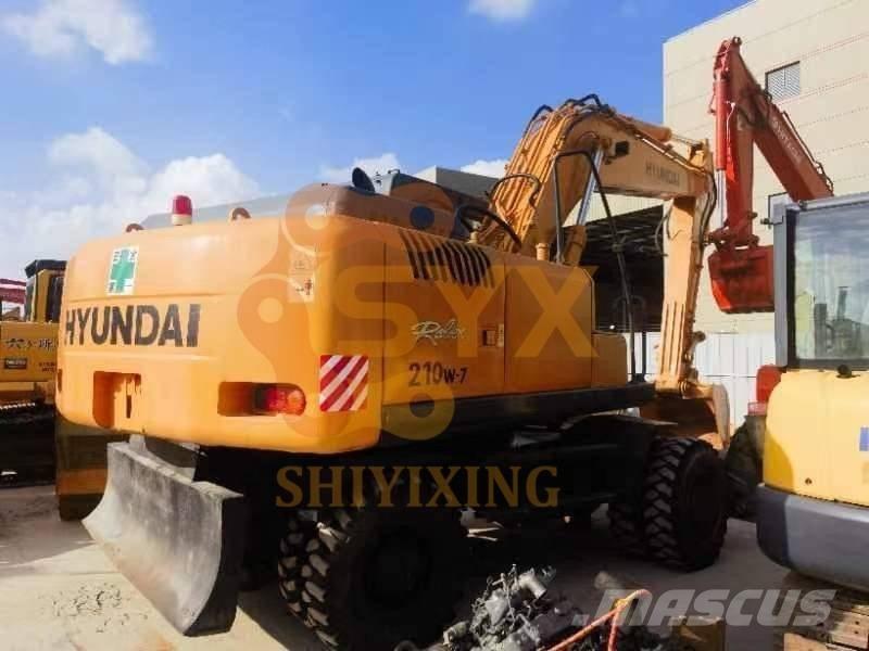 Hyundai 210W-7 حفارات بعجل