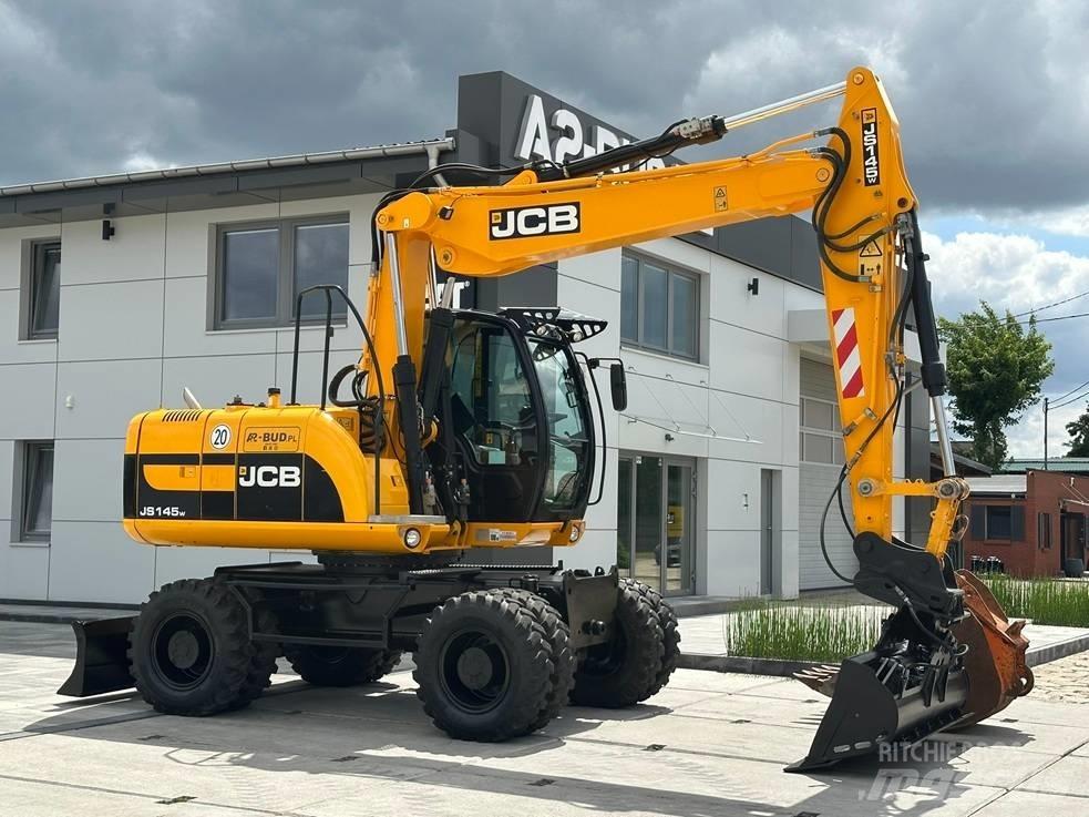 JCB JS 145 W حفارات بعجل