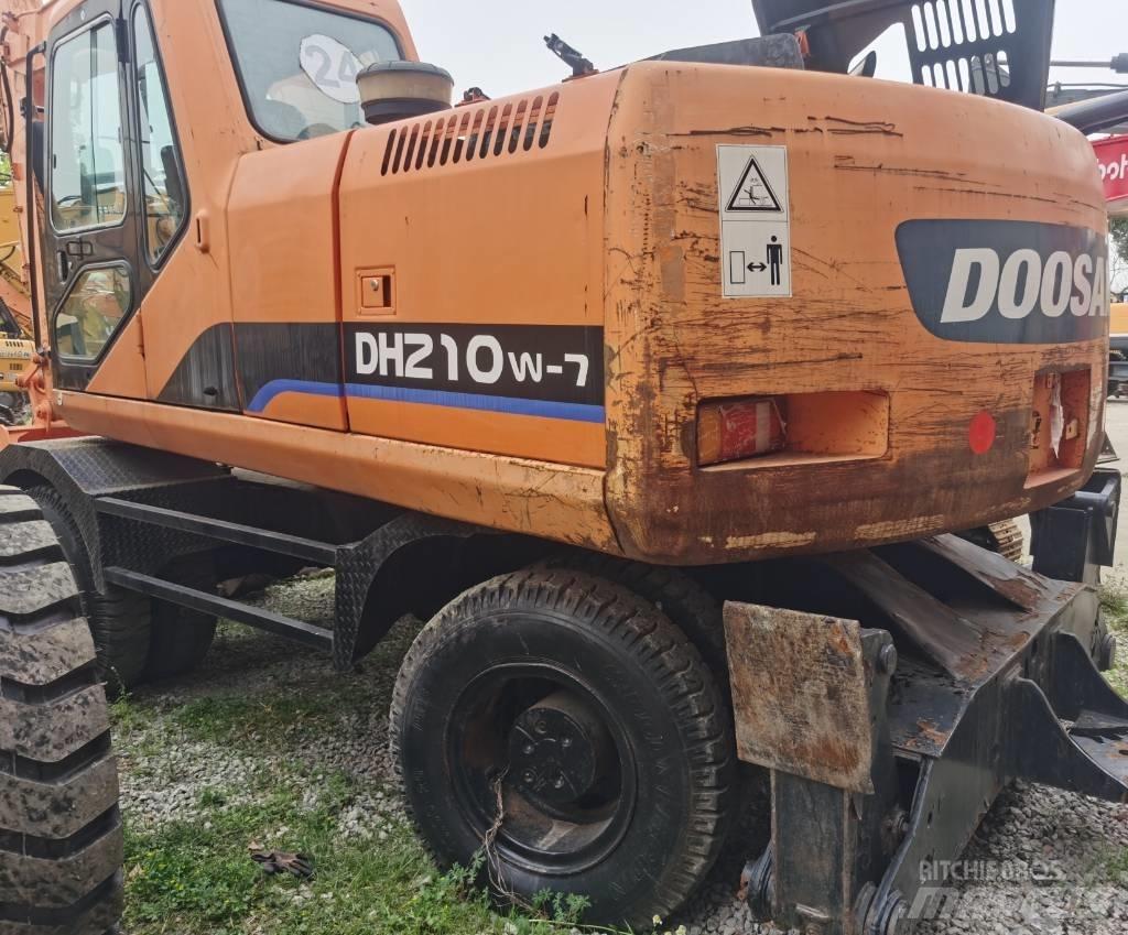 Doosan DH 210 W-7 حفارات بعجل
