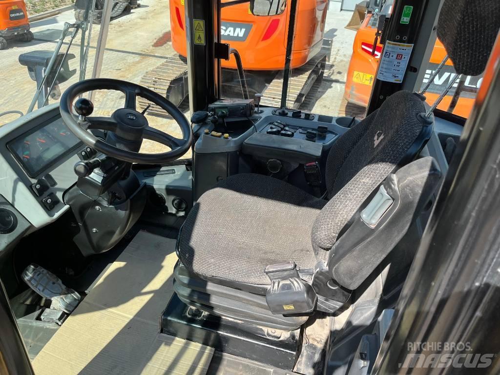 CAT 950 لوادر بعجل