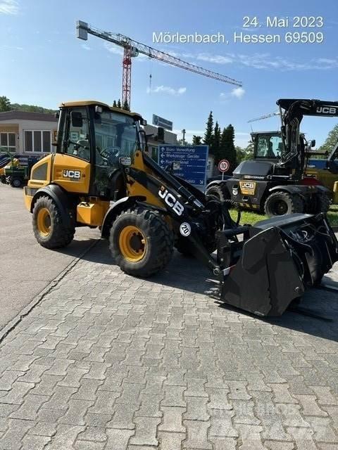 JCB 409 لوادر بعجل