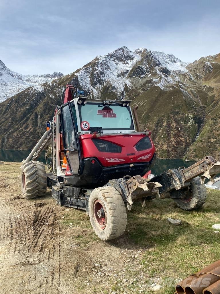 Menzi Muck 325 حفارات بعجل