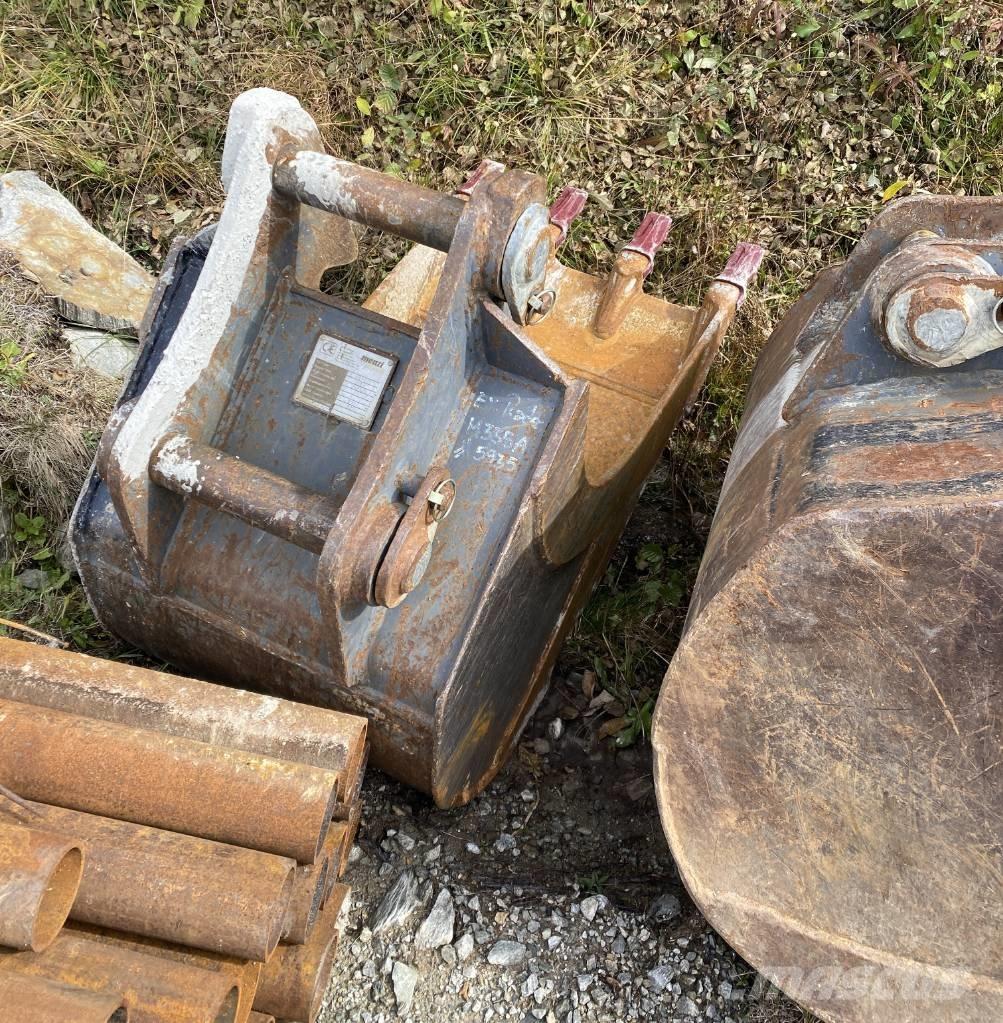 Menzi Muck 325 حفارات بعجل