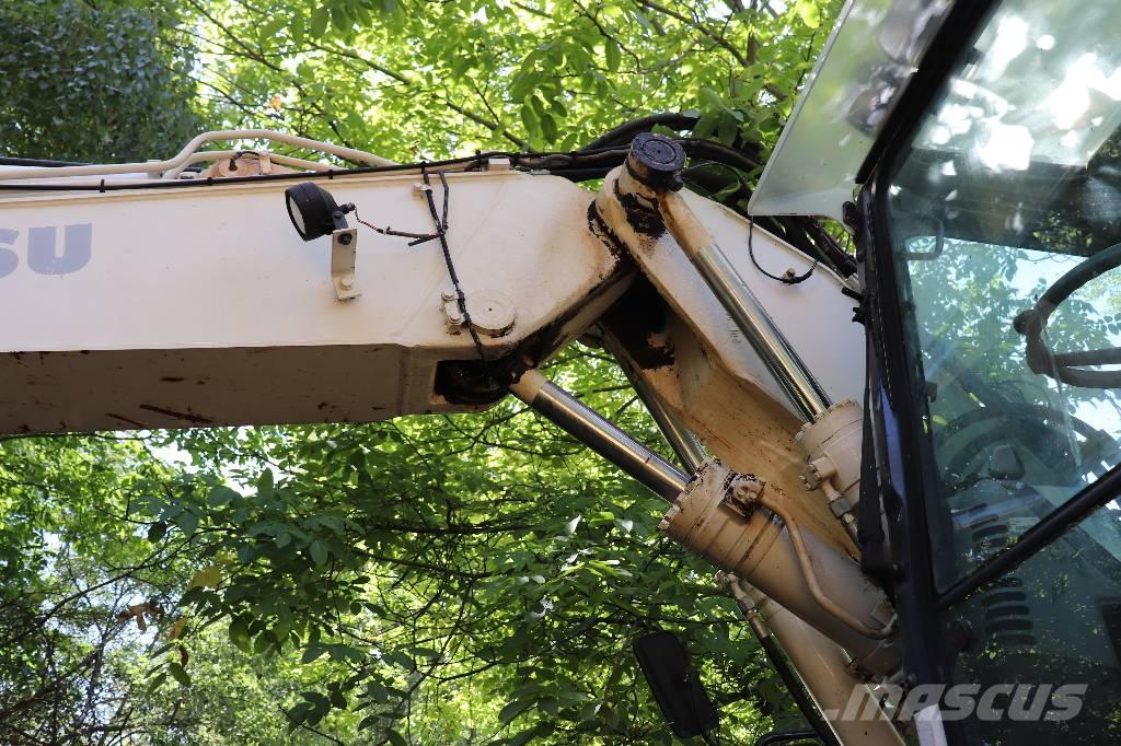 Komatsu PW 140-7 لوادر ذات جرافات عكسية