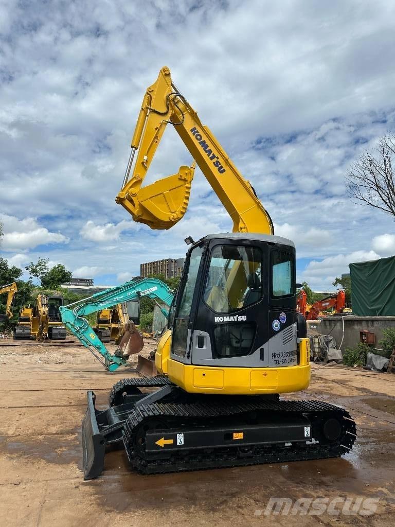Komatsu PC 78 US حفارات زحافة