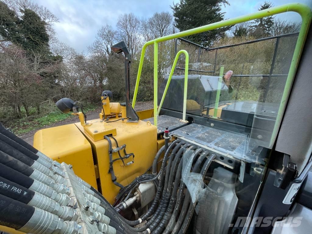 Komatsu PW 180-11 حفارات بعجل