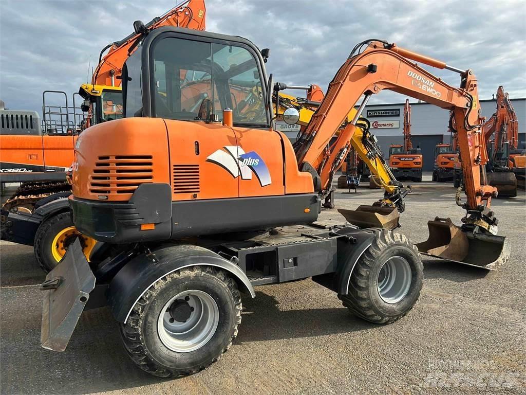 Doosan 55w حفارات بعجل