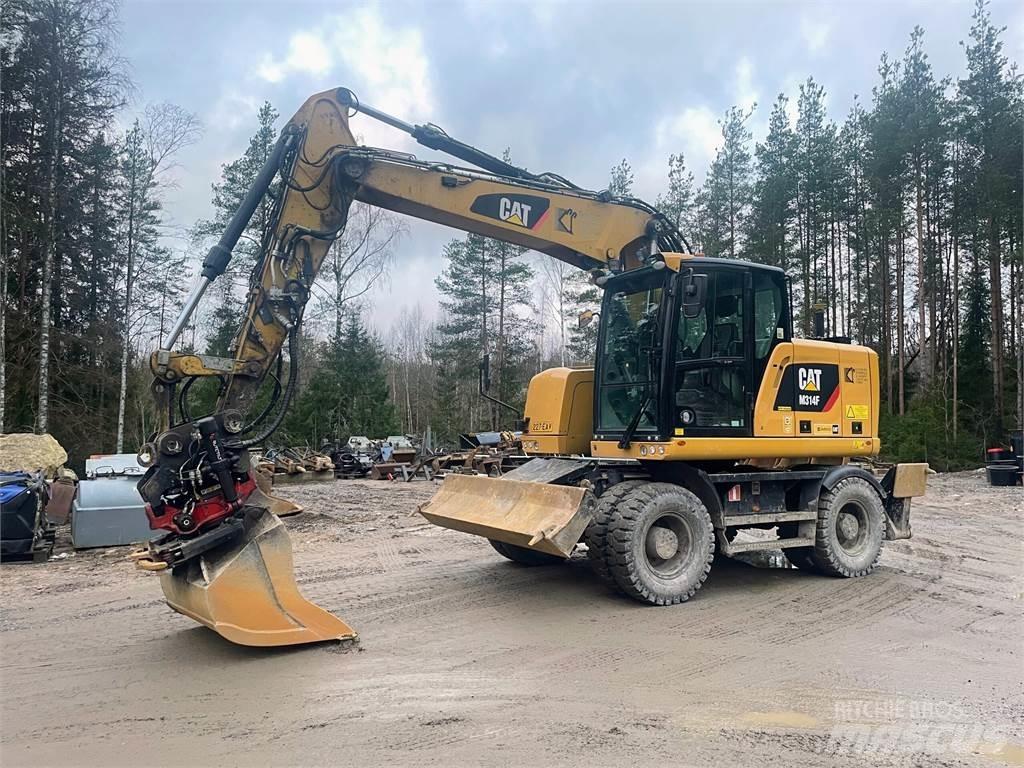 CAT M 314 F حفارات بعجل