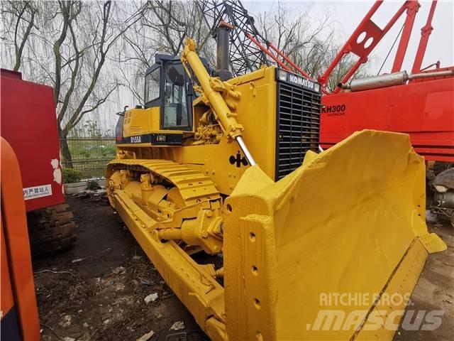 Komatsu D155A بلدوزرات مجنزرة