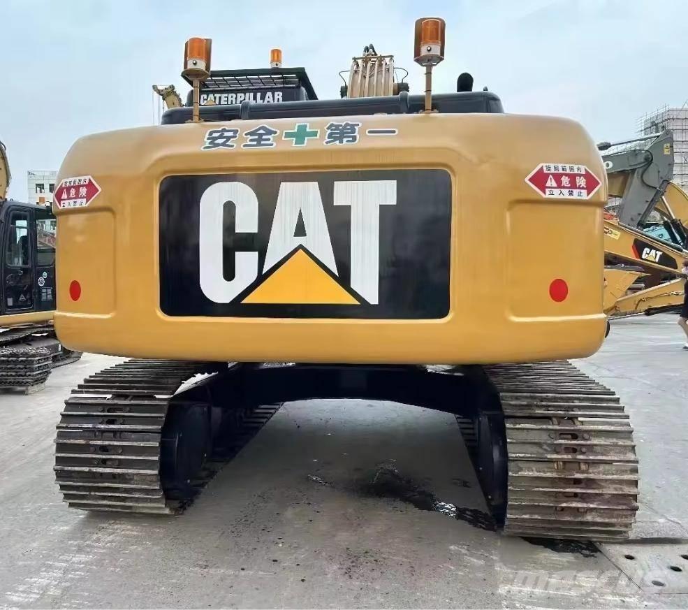 CAT 323 D حفارات زحافة