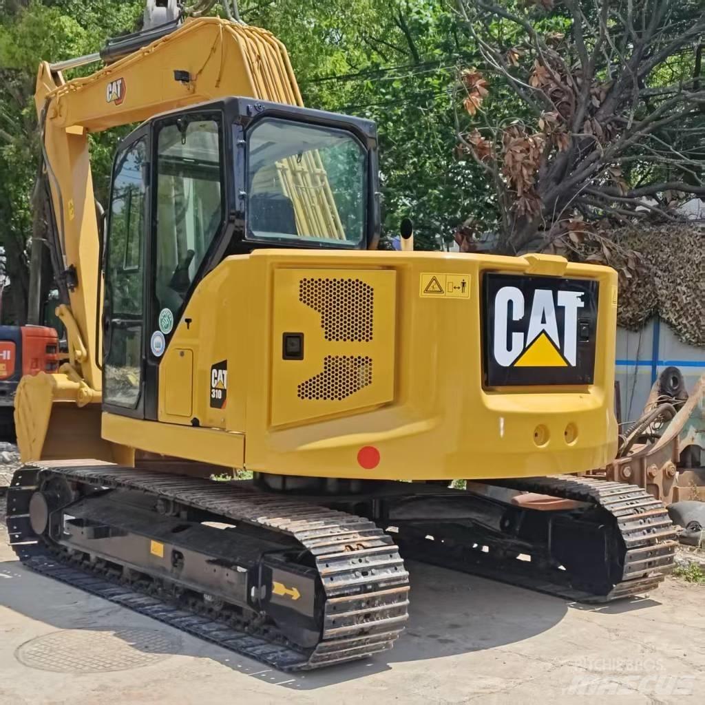 CAT 310 حفارات وسط 7 طن - 12 طن