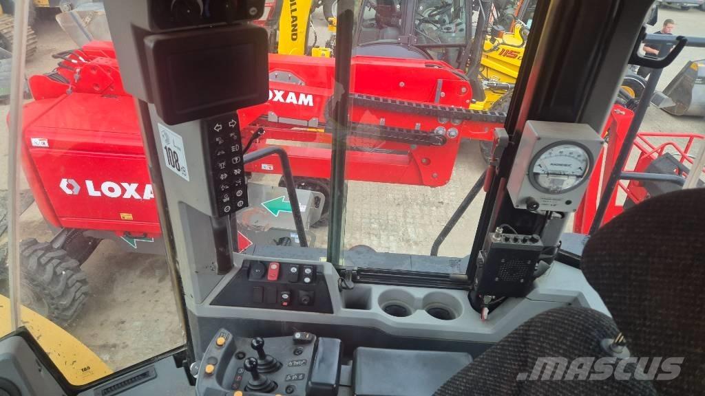 CAT 966 M لوادر بعجل