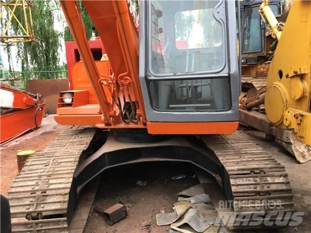 Hitachi EX 100 حفارات زحافة